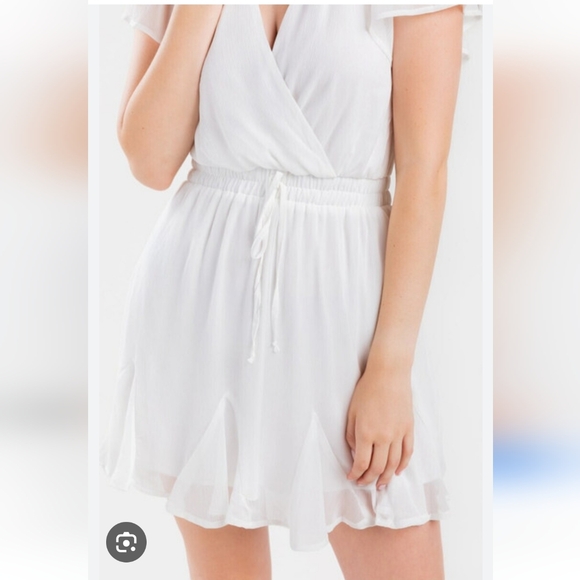 Francesca’s Mi Ami Gianne Godet White  Shiny Lined Wrap Mini Dress | Size Small. - Picture 2 of 12
